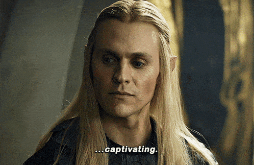 a man with long blonde hair and ears says captivating