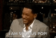 a man in a suit is laughing and says `` i am serious pop '' .