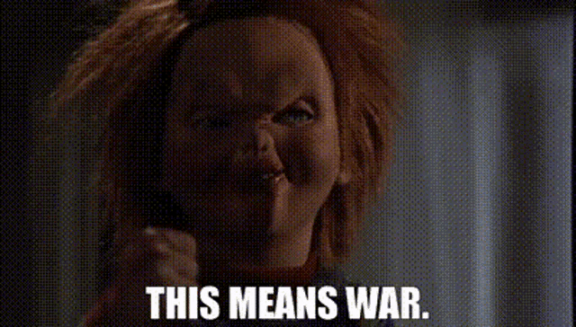 chucky from childs play is making a funny face and says `` this means war '' .
