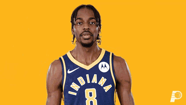 a basketball player wearing a jersey that says indiana 8