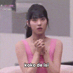 a woman in a pink tank top with koko de isi written on the bottom