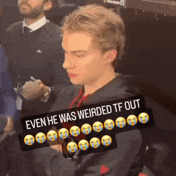 a young man sitting in a locker room with a caption that says " even he was weirded tf out "