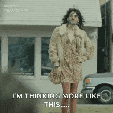 a man in a fur coat is standing in front of a building and says i 'm thinking more like this ..