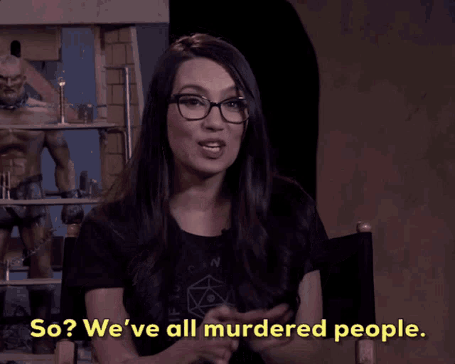 a woman wearing glasses and a black shirt says so we 've all murdered people