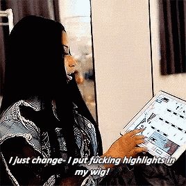 a woman is holding a tablet and saying " i just change - i put fucking highlights in my wig "