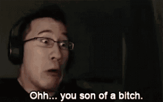 a man wearing glasses is giving the middle finger and says `` ohh ... you son of a bitch . ''