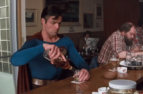 Superman Drink GIF - Superman Drink GIFs