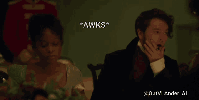 a man and a woman are sitting at a table with a caption that says " awks "
