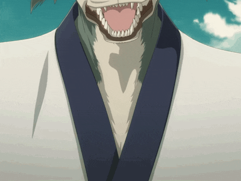 a close up of a person 's face with a blue collar