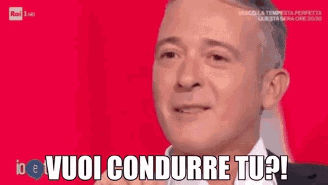 a man with the words vuoi conducre tu written on his face
