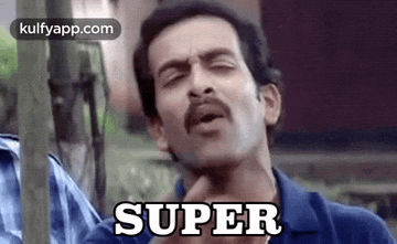 a man with a mustache is making a funny face while holding his hand to his chin and saying `` super '' .