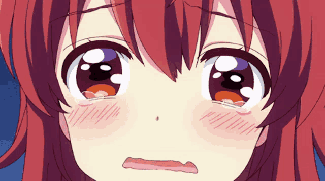 a close up of a girl 's face with tears running down her face