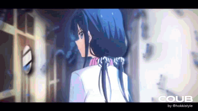 a girl with blue hair is standing in a hallway looking at a mirror .