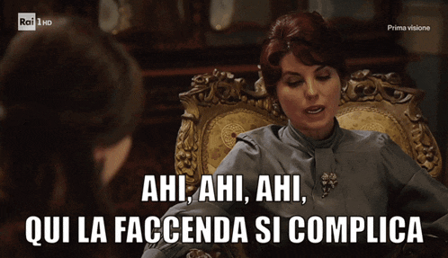a woman sitting in a chair with the words ahi ahi ahi qui la facenda si complicata