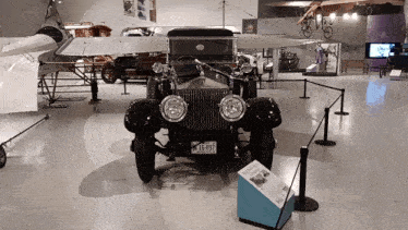 a black car with a license plate that says 15897