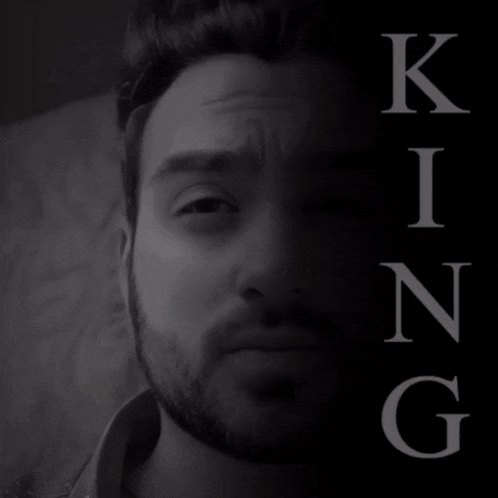 a black and white photo of a man with the word king written on it