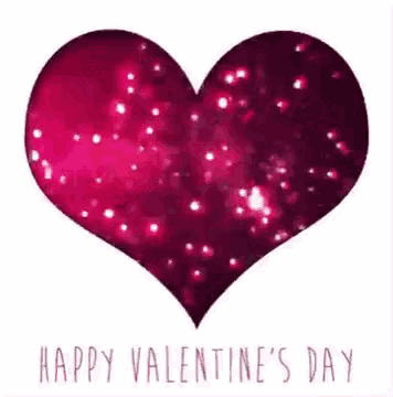 a pink heart with the words `` happy valentine 's day '' written below it .
