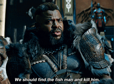 a man in a fur coat with the words we should find the fish man and kill him below him
