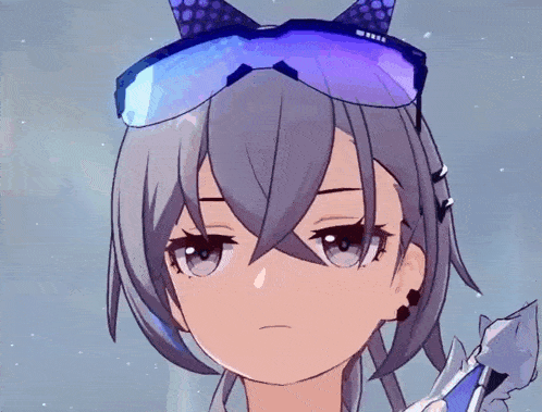 a close up of a cartoon character wearing sunglasses and a bow on her head .