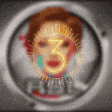 a woman 's face is in a circle with the number 3 in the center