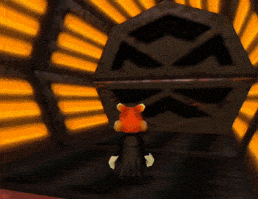 a cartoon character with a red hat is standing in front of a large black object