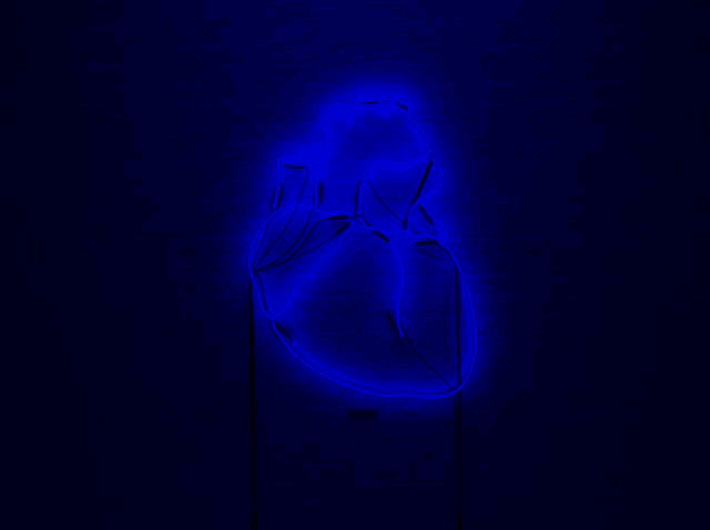 a neon sign of a human heart is lit up in blue