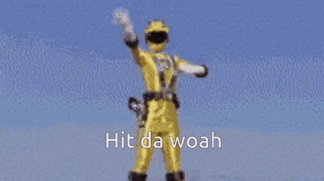 a yellow power ranger says hit da woah while standing in the rain .