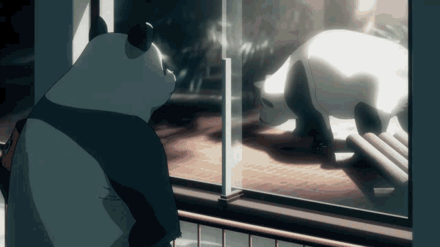 a panda bear is looking out a window at another panda