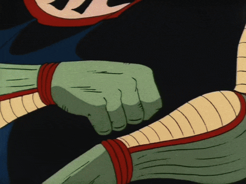 a close up of a cartoon character 's fist with a red stripe on the wrist