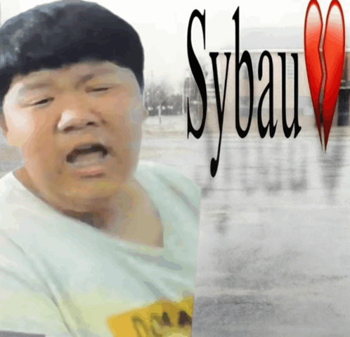a man with a broken heart and the word sybau behind him