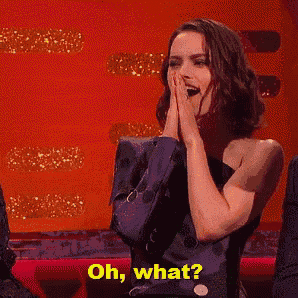a woman in a purple dress is saying " oh what "