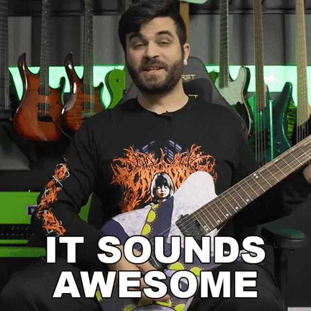 a man holding a guitar with the words " it sounds awesome " on the bottom