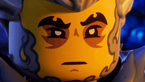 a close up of a lego character 's face with a beard