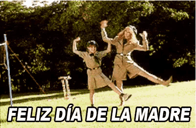 a picture of two women jumping in the air with the words feliz dia de la madre above them