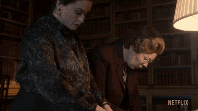 two women in a library with a netflix logo on the bottom