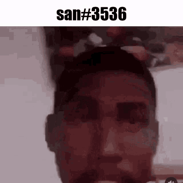 a close up of a man 's face with the words san # 3536 written above him .