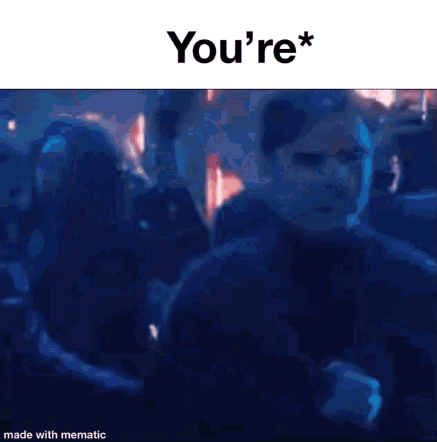 a blurry picture of a man dancing in a crowd with the words `` you 're '' written above him .