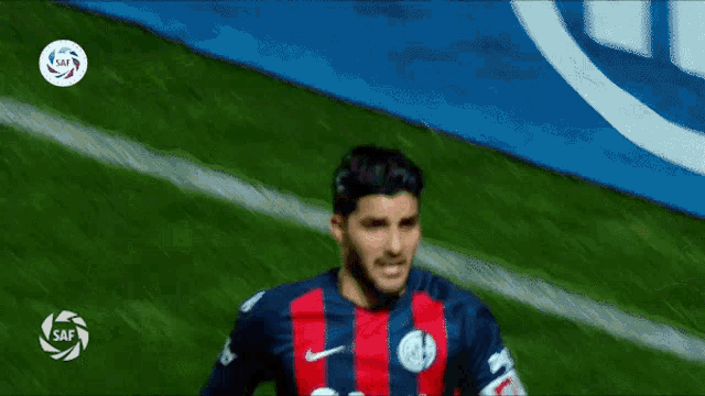 a soccer player wearing a shirt that says banq ciudad