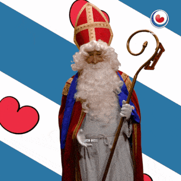 a man with a beard is holding a cane in front of a blue and white background