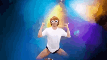 a pixelated image of a man in a white shirt and sunglasses
