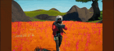 a person is holding a gun in a field of orange flowers .