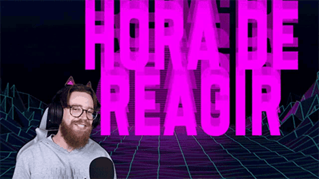 a man with a beard wearing headphones and glasses stands in front of a sign that says hora de reagir