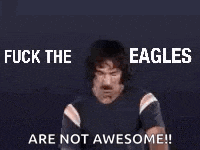 a man with a mustache is giving the middle finger and saying `` fuck the eagles are not awesome ! ''