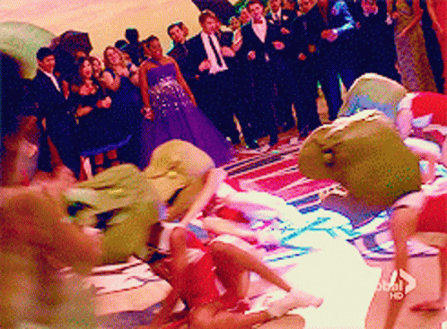 Glee Dinosaur GIF - Glee Dinosaur Cheerleaders GIFs