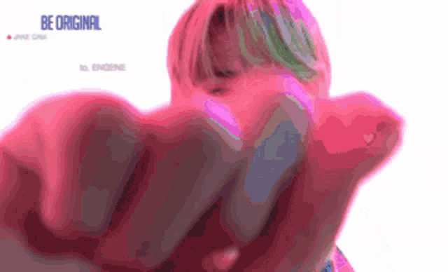 a blurred image of a person 's face with the words be original on the bottom