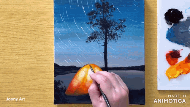 a painting of a tree and a tent is being painted on a canvas by joony art