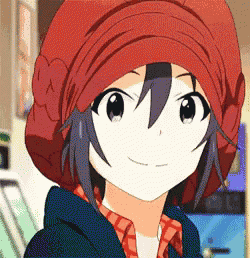 a close up of a girl wearing a red hat and a plaid shirt
