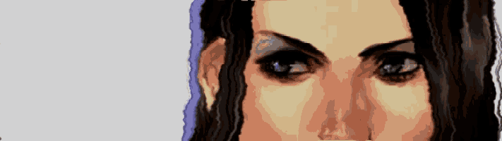 a close up of a woman 's face with a purple stripe on her forehead