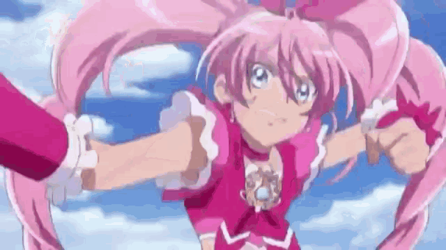 a girl with pink hair is holding a person 's hand in a pink dress .