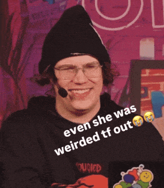 a man wearing glasses and a beanie is smiling with a caption that says even she was weirded tf out